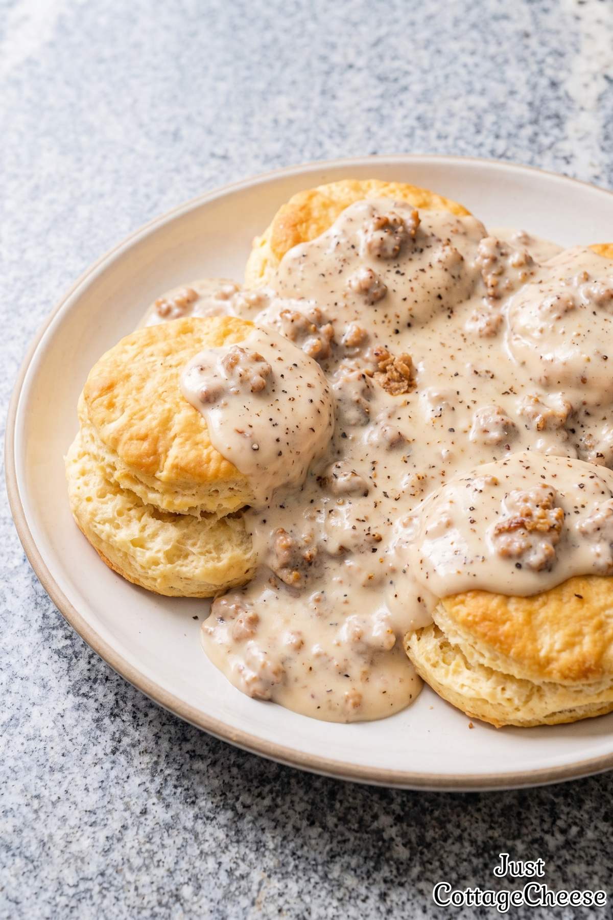 Golden biscuits smothered in sausage gravy