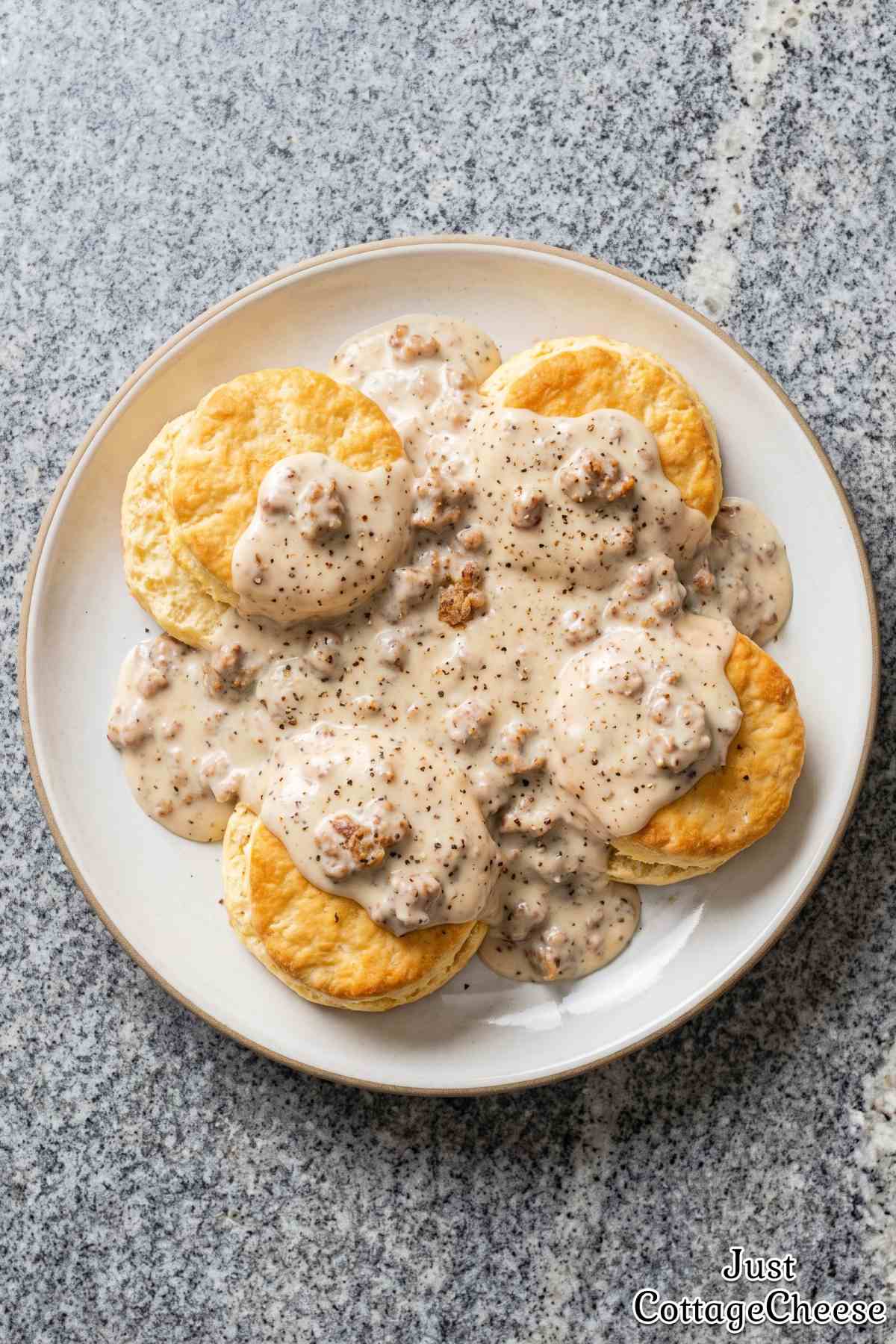 Thick sausage gravy over warm biscuits