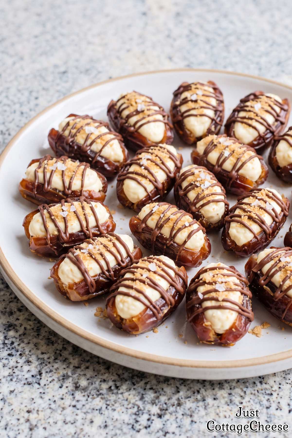 Delicious cheesecake stuffed dates on a plate