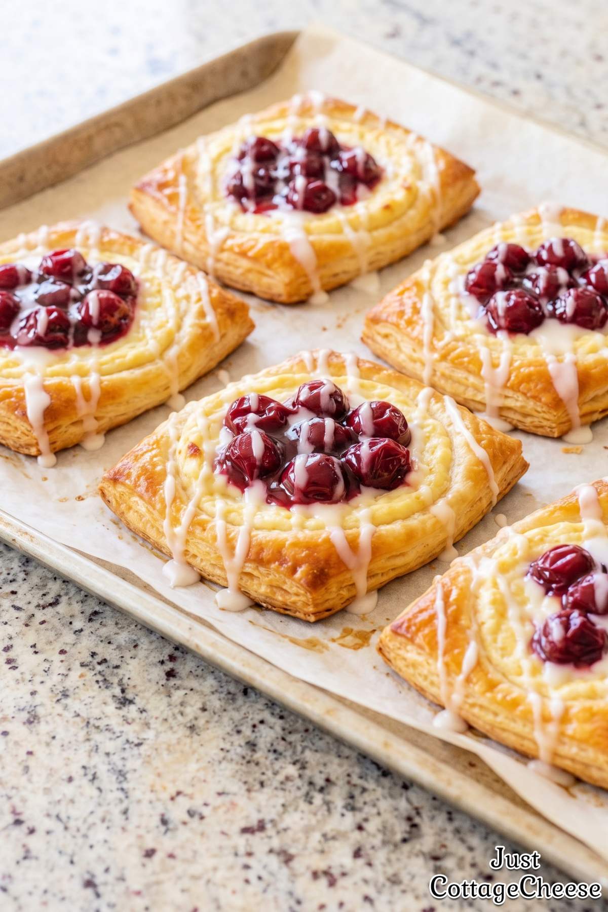 Glazed cottage cheese cherry breakfast pastry