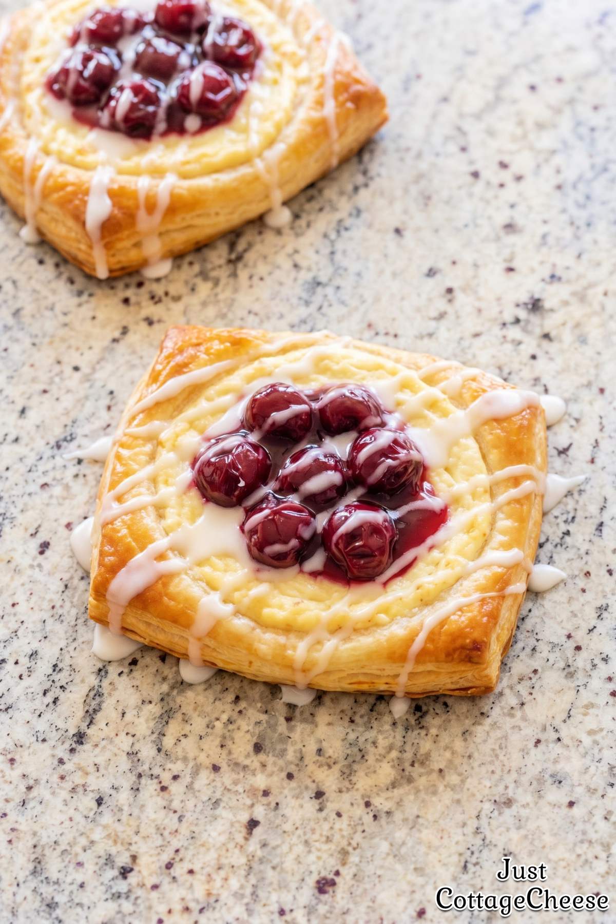 Soft cherry danish with sweet cheese filling