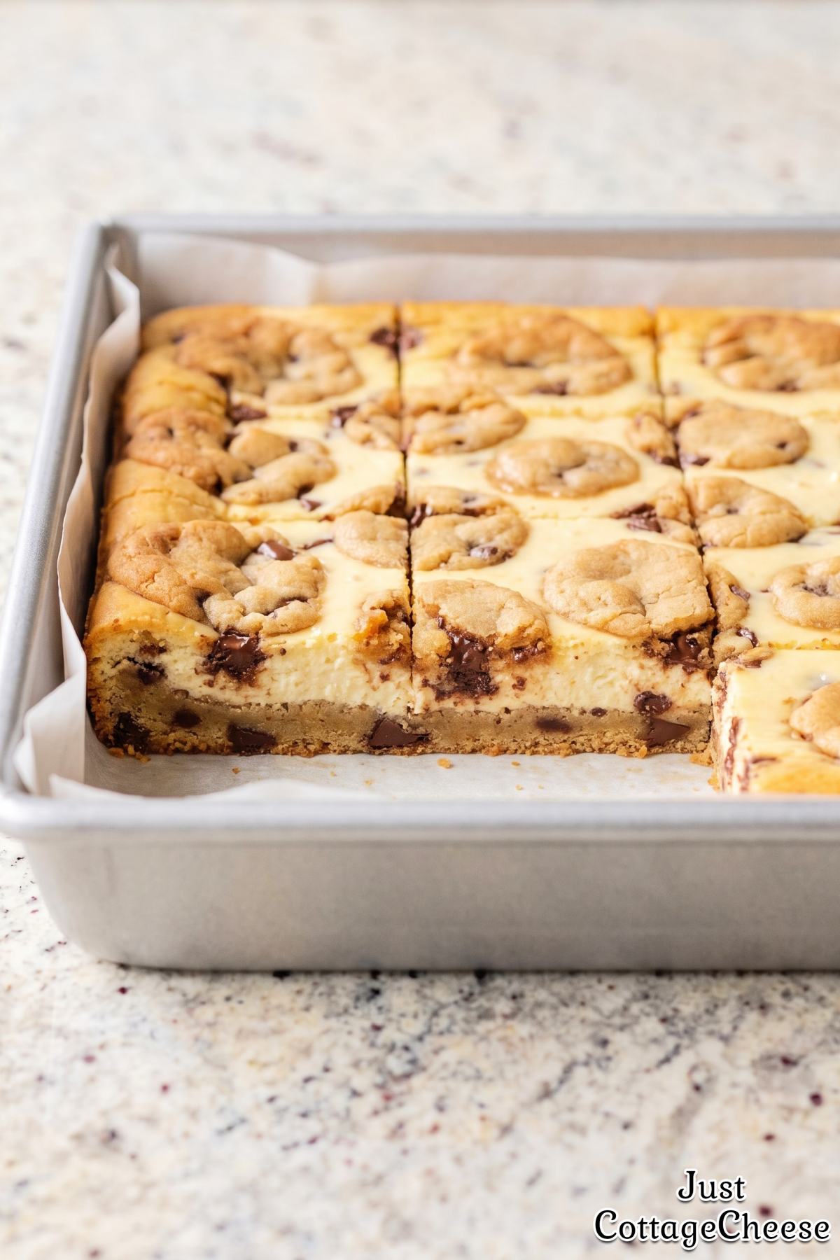 Stack of rich chocolate chip cheesecake bars