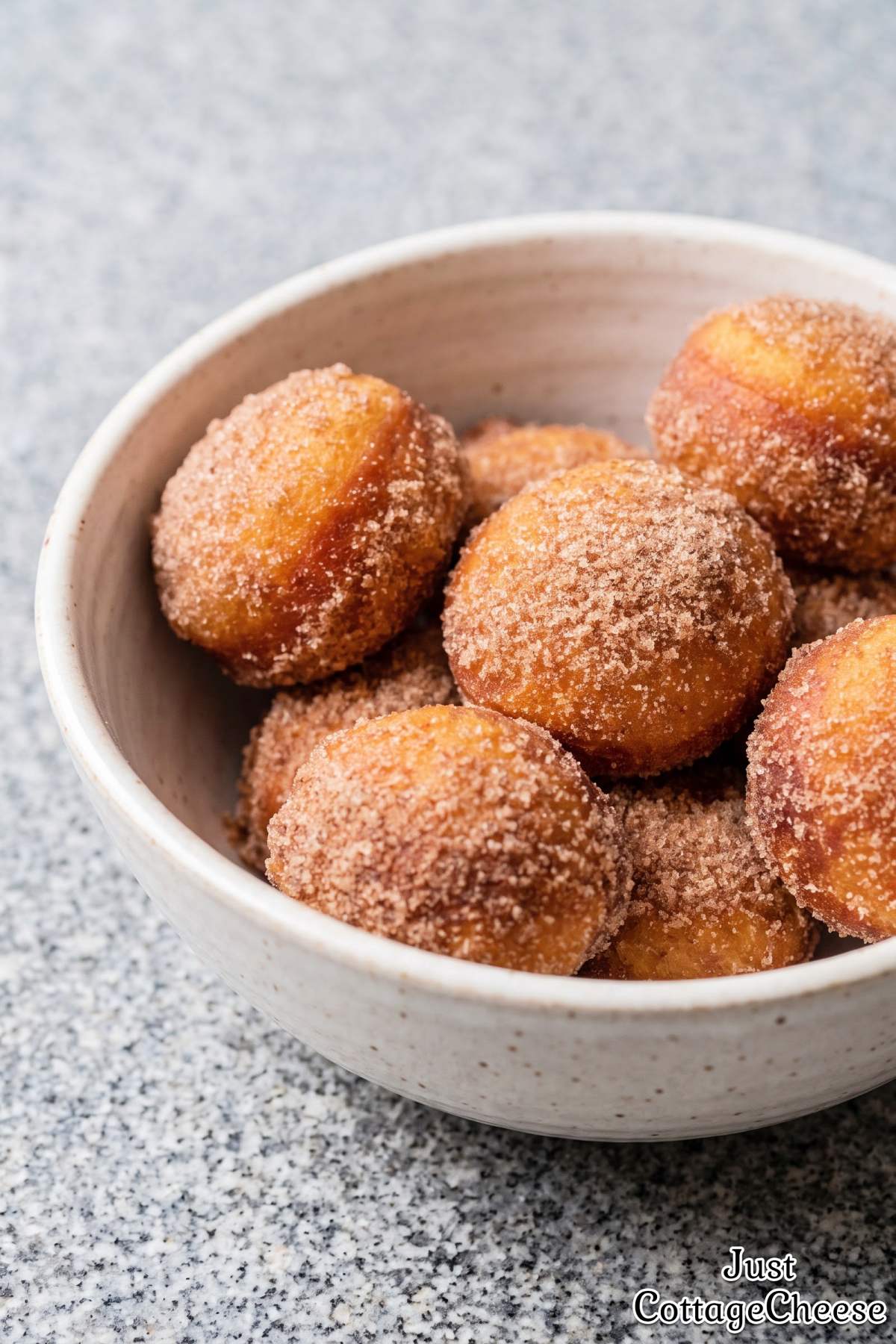 Fluffy cinnamon sugar cottage cheese donuts