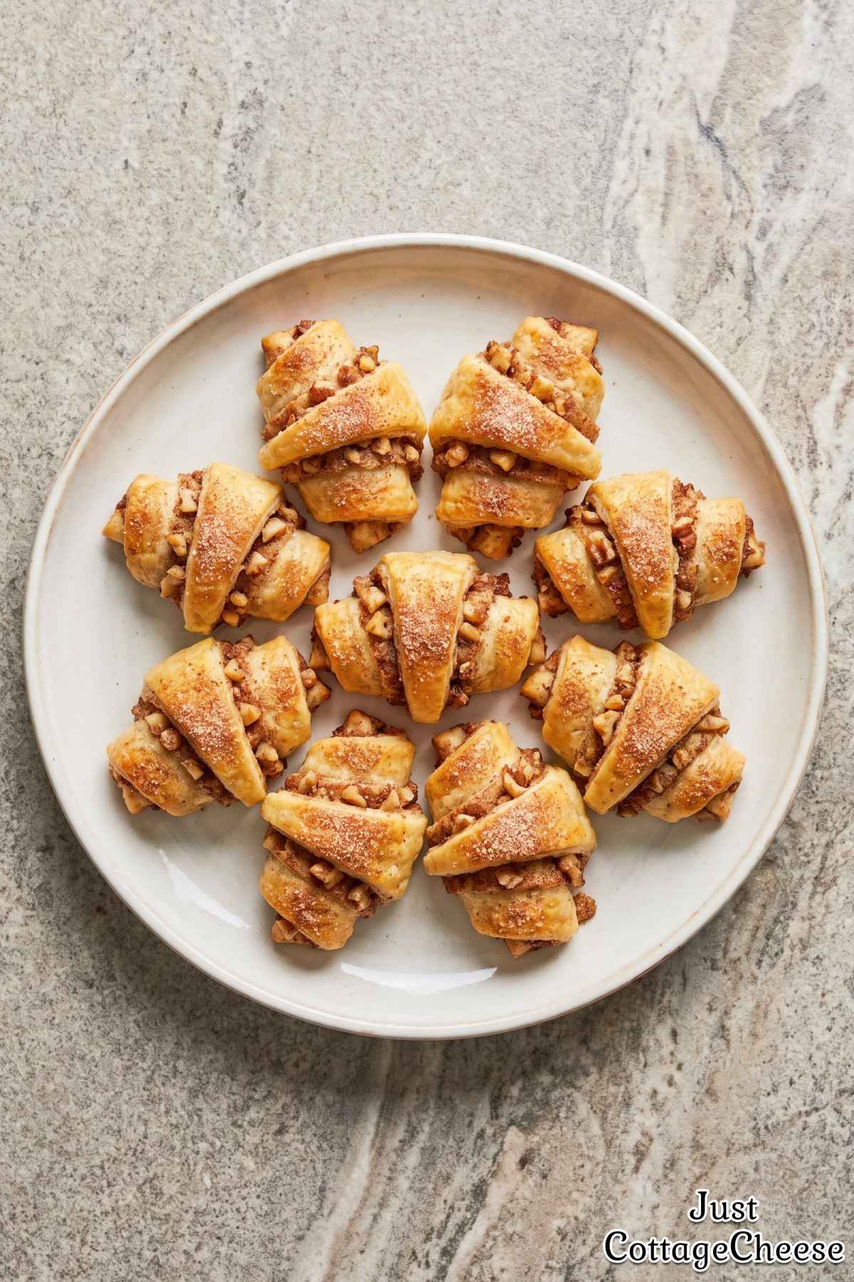 Golden cinnamon walnut rugelach cookies