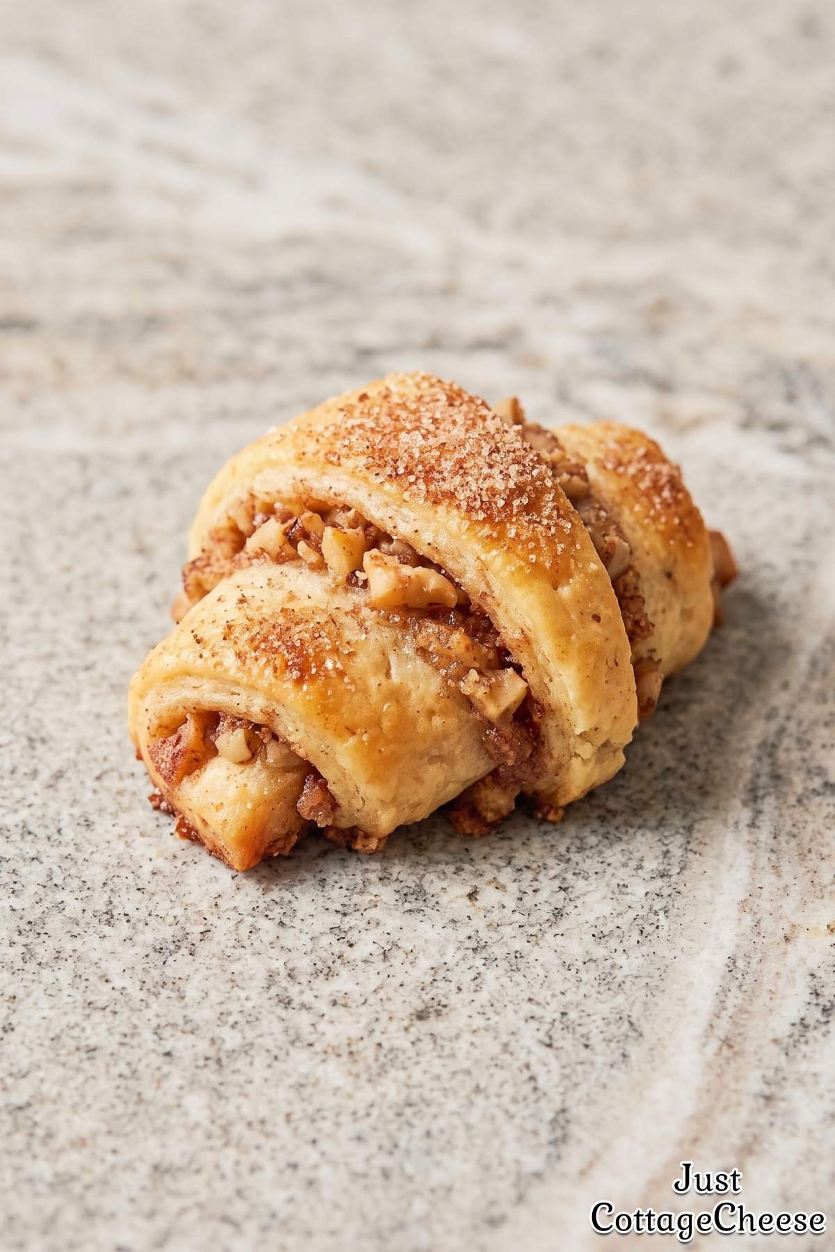 Sweet cinnamon walnut rugelach on a tray