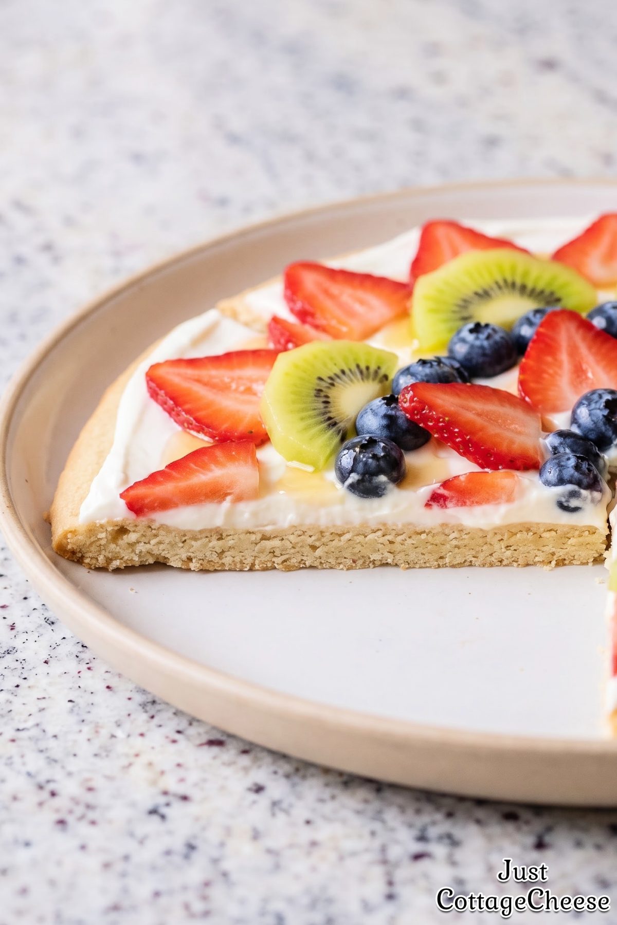 Fresh cottage cheese fruit pizza with berries