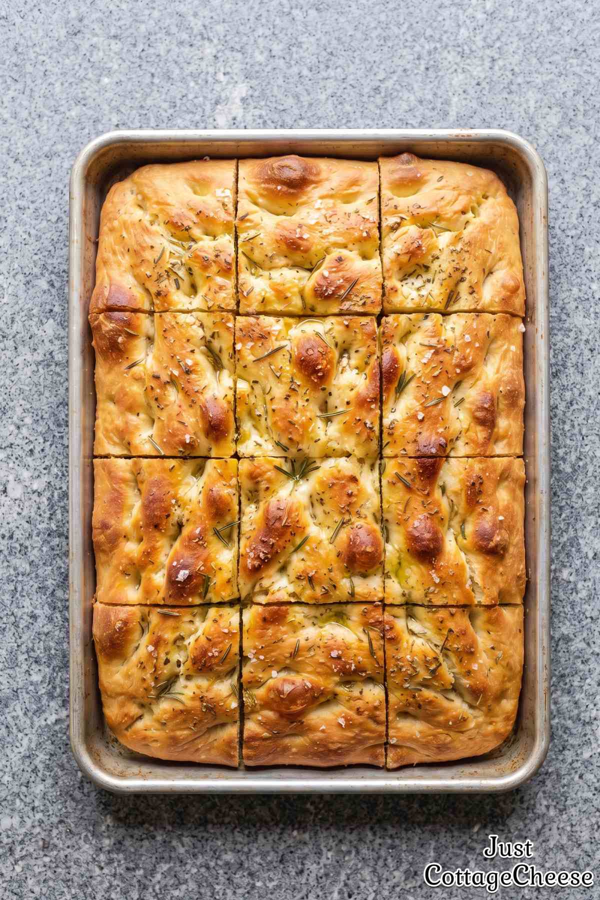 Cottage cheese herb focaccia on wood board