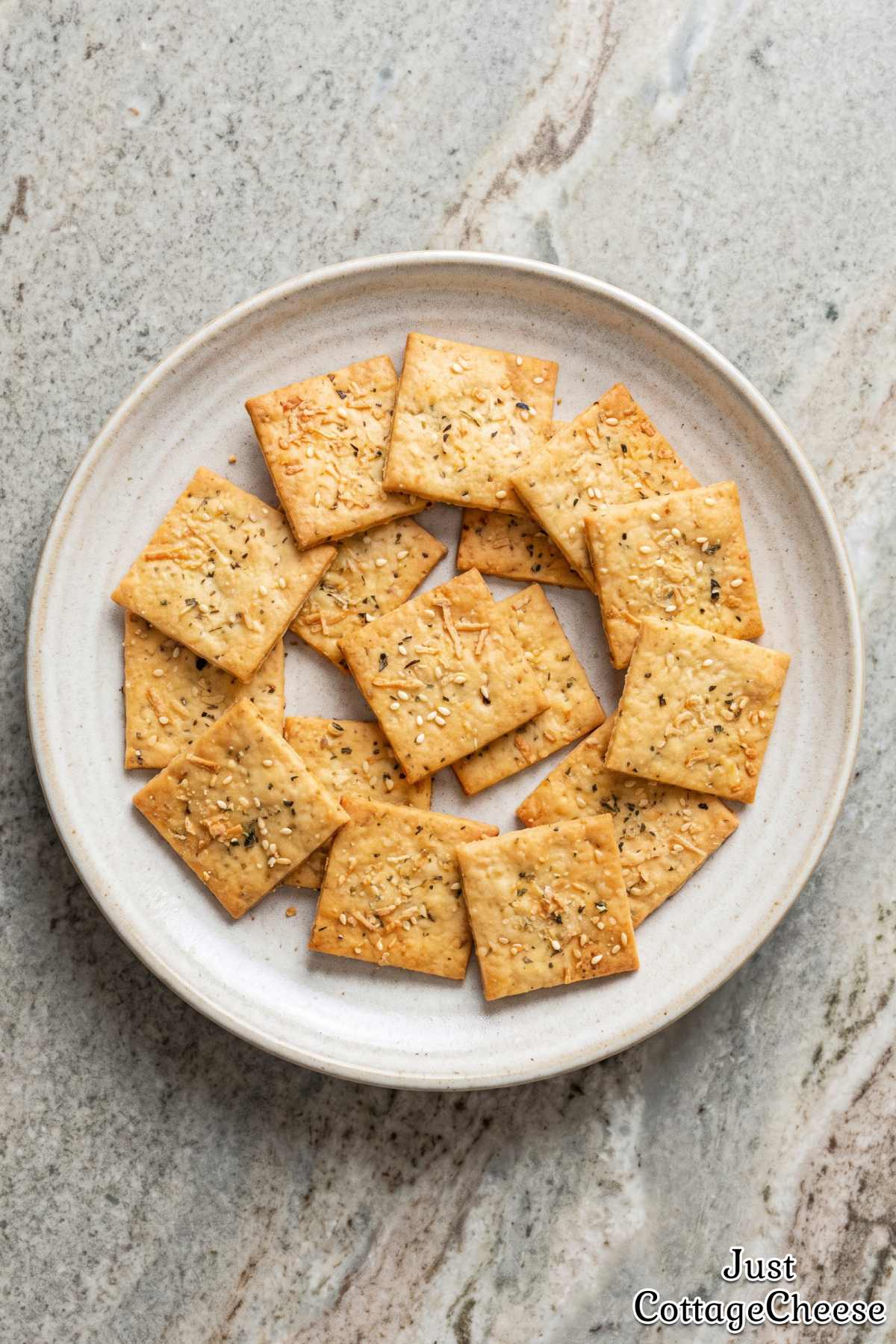 Cheesy herb protein crackers