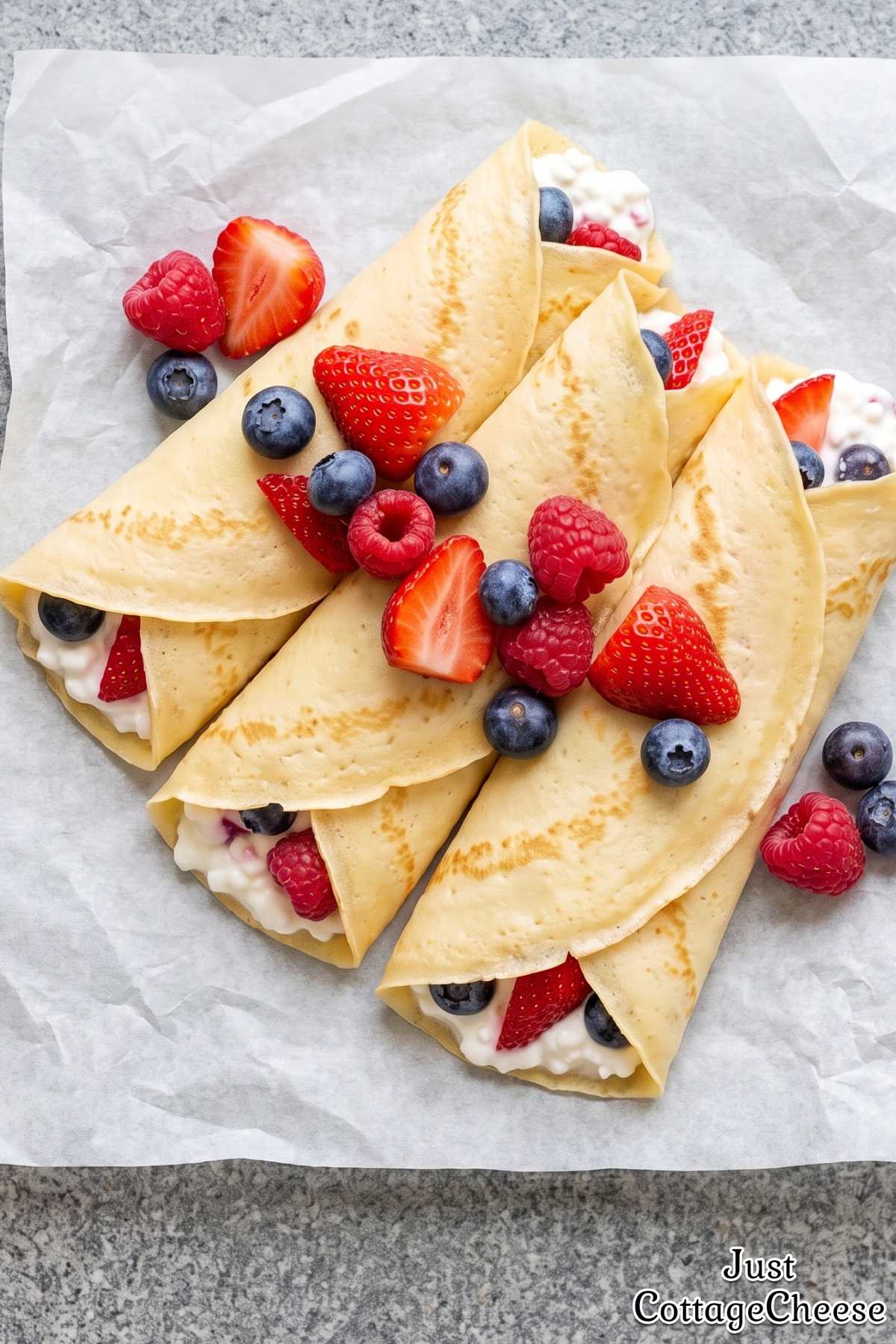 Sweet berry stuffed crepes with cottage cheese