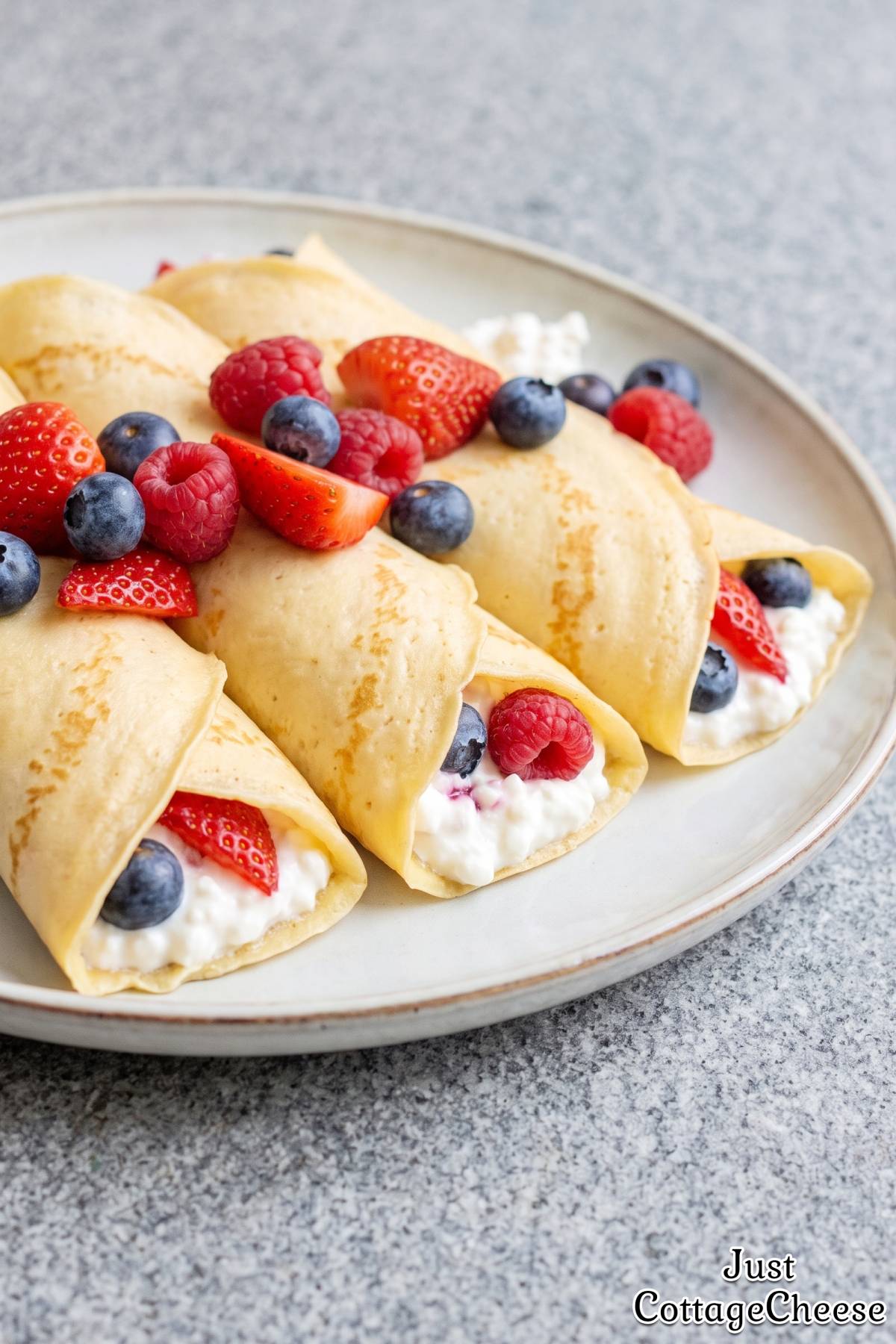 Warm protein crepes filled with fresh berries