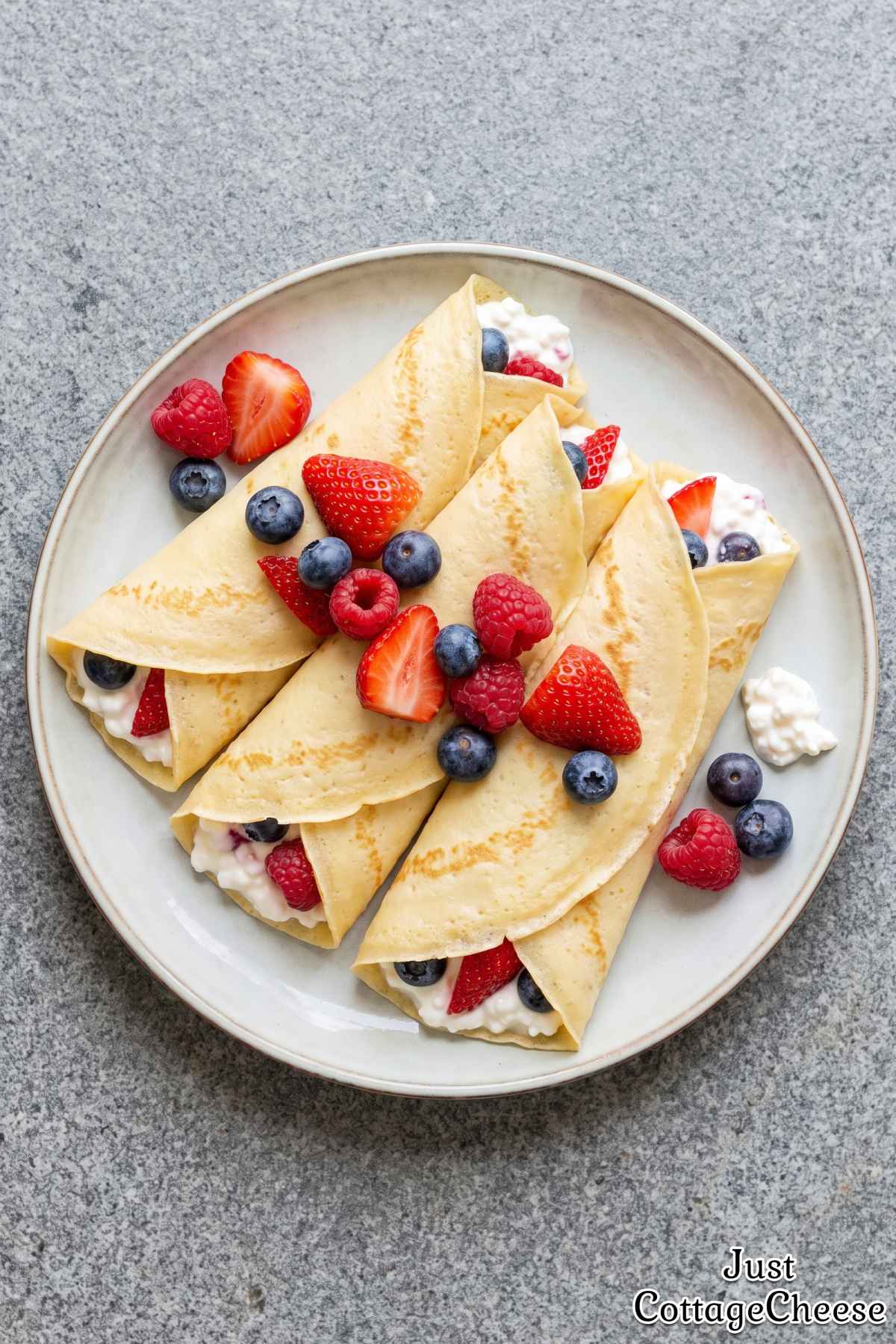 Fresh berry stuffed cottage cheese crepes