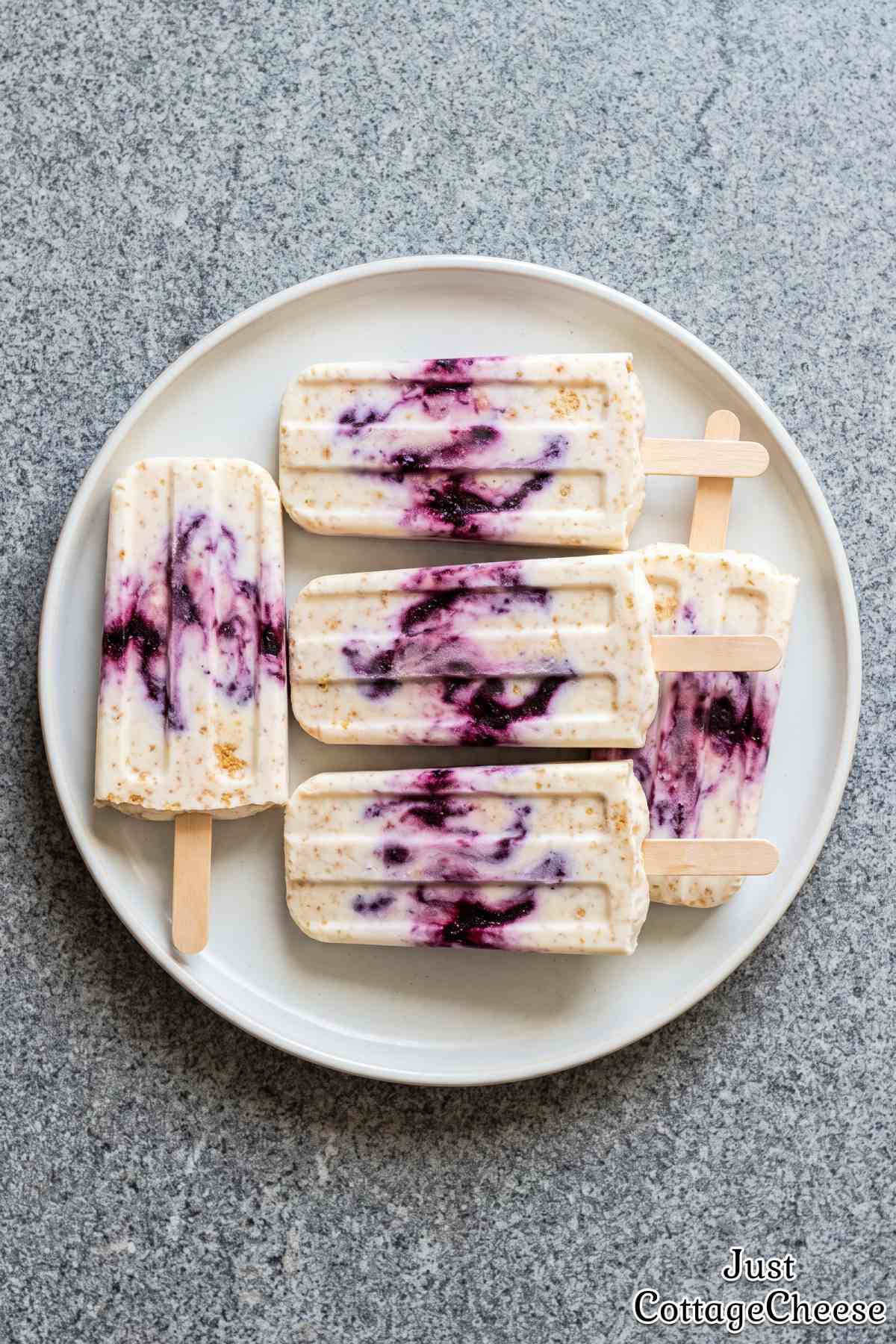 Fresh blueberry protein cheesecake pops