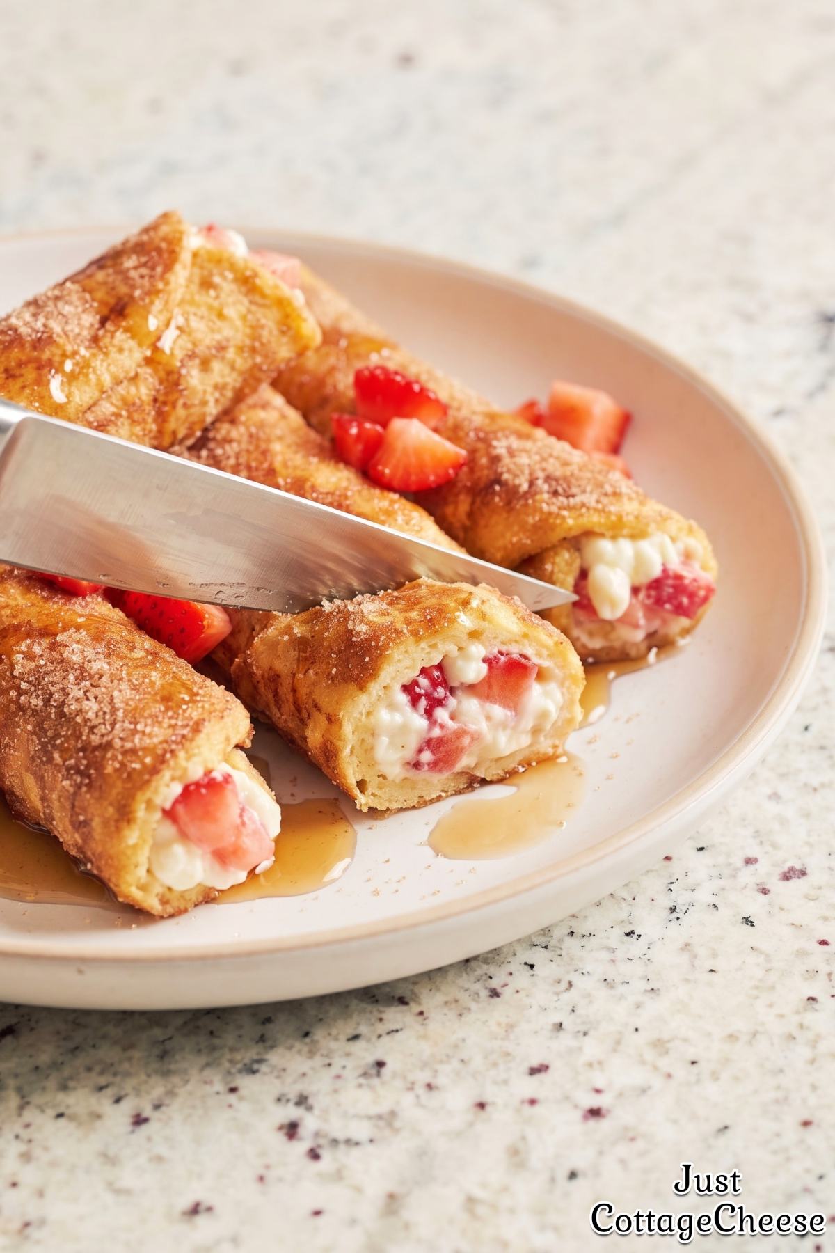 Crispy protein French toast roll ups on a plate