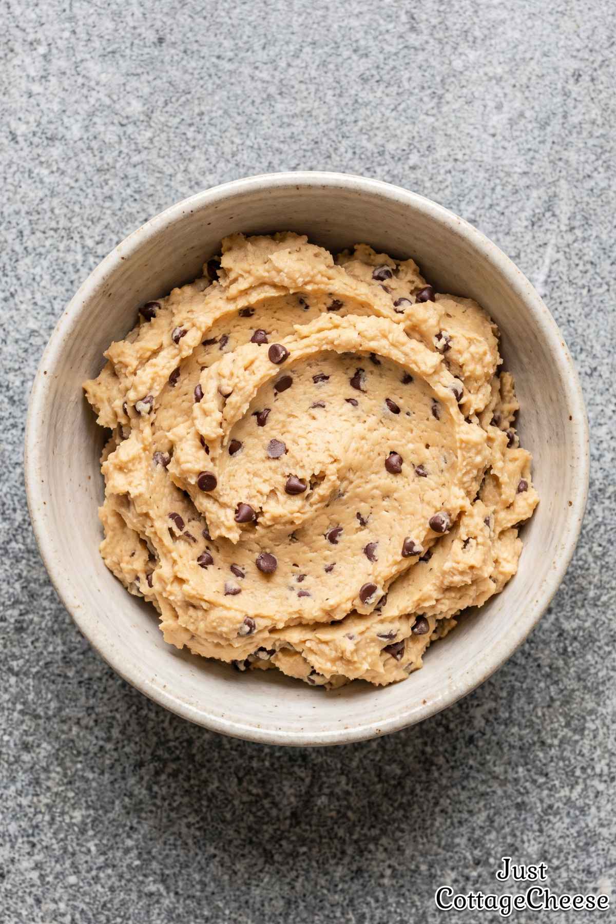 Chocolate chip cookie dough in a bowl