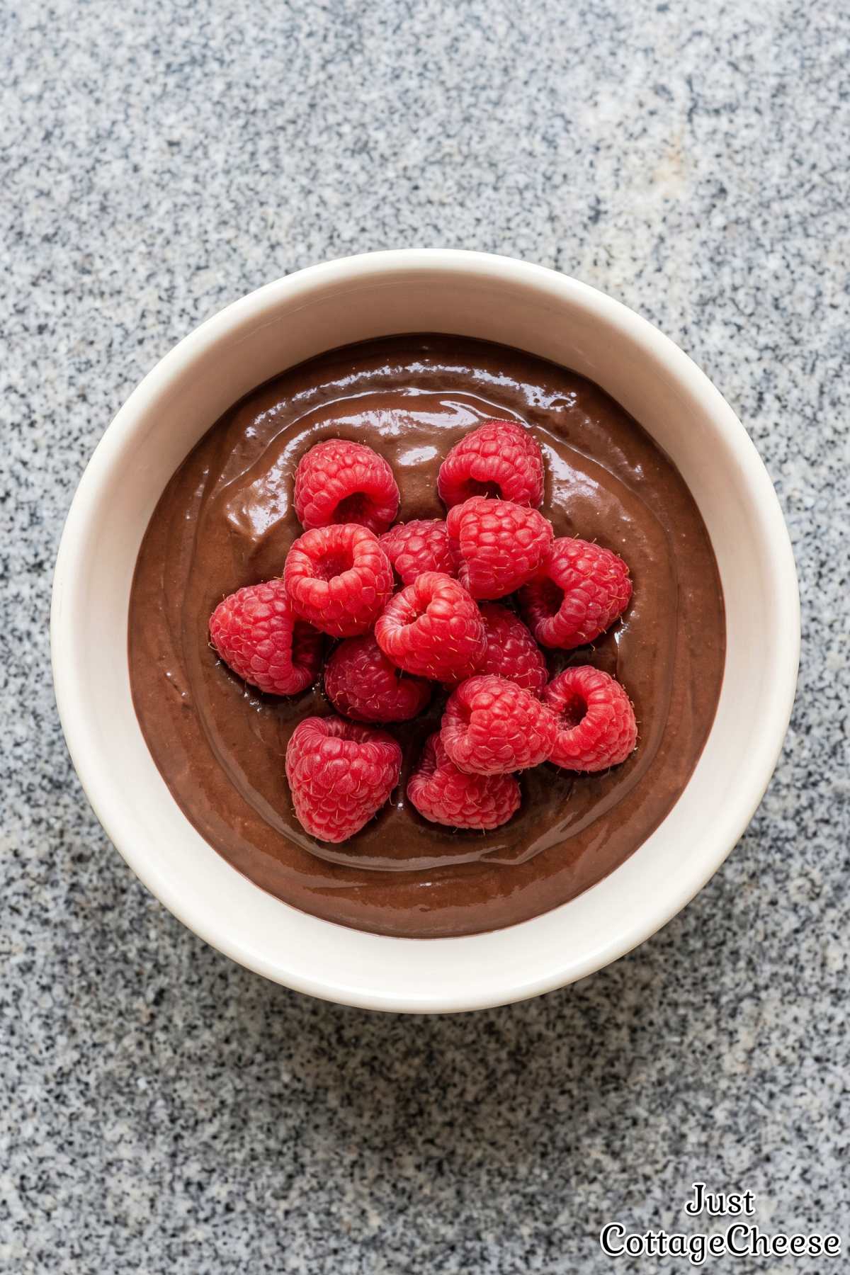 Chocolate protein mousse topped fresh
