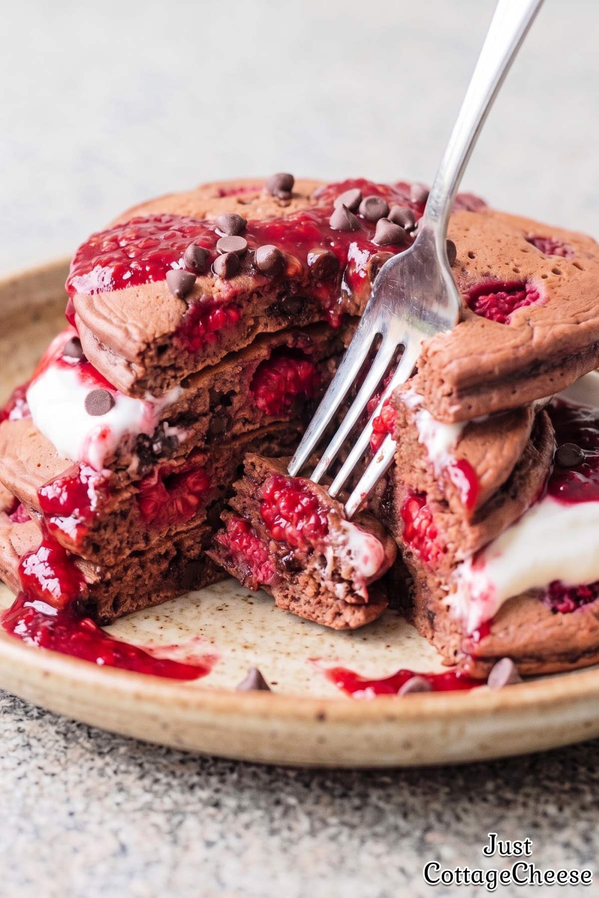 Fluffy chocolate raspberry protein pancakes