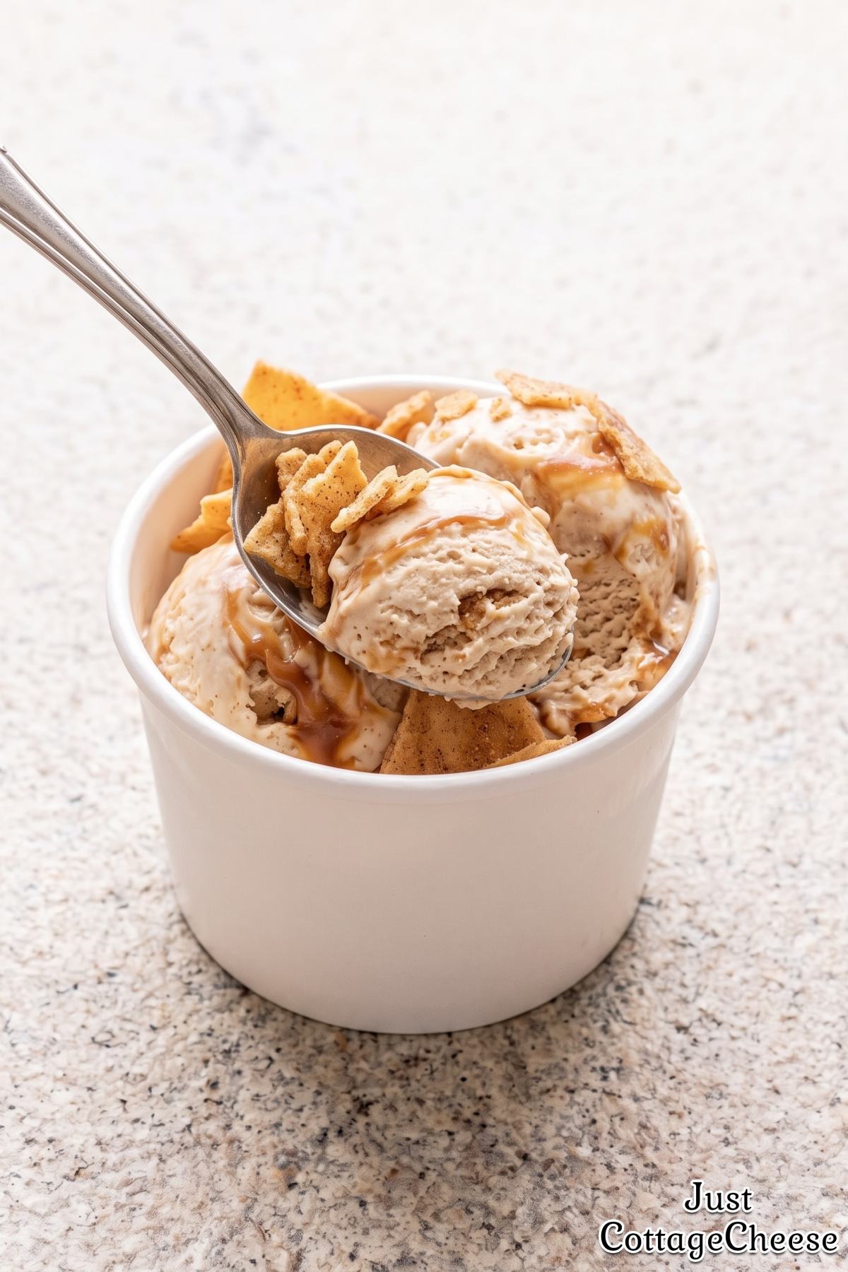 Scoop of churro cottage cheese ice cream