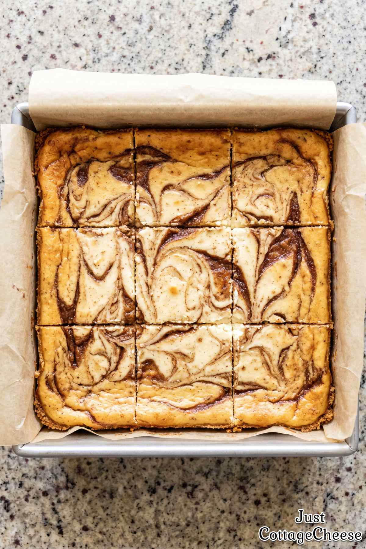 Swirled cinnamon roll cheesecake bars