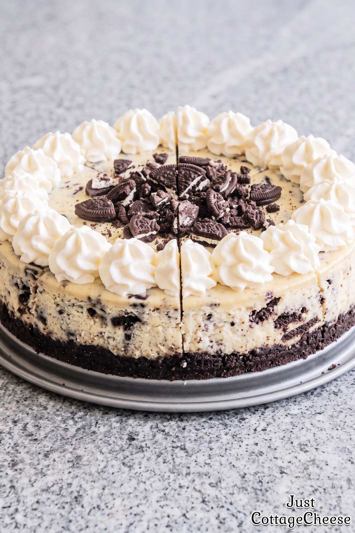 Slice of protein cookies and cream cheesecake