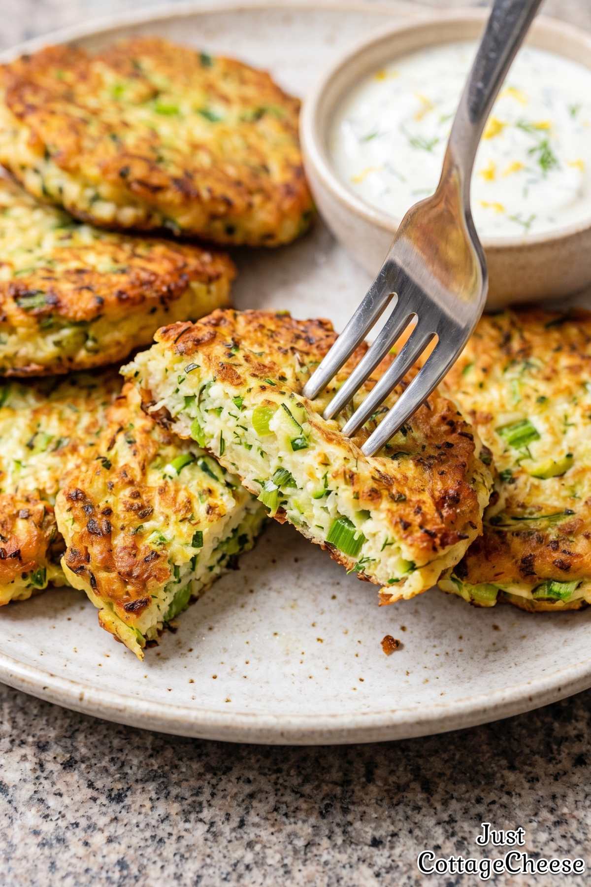 Crispy zucchini fritters with cottage cheese