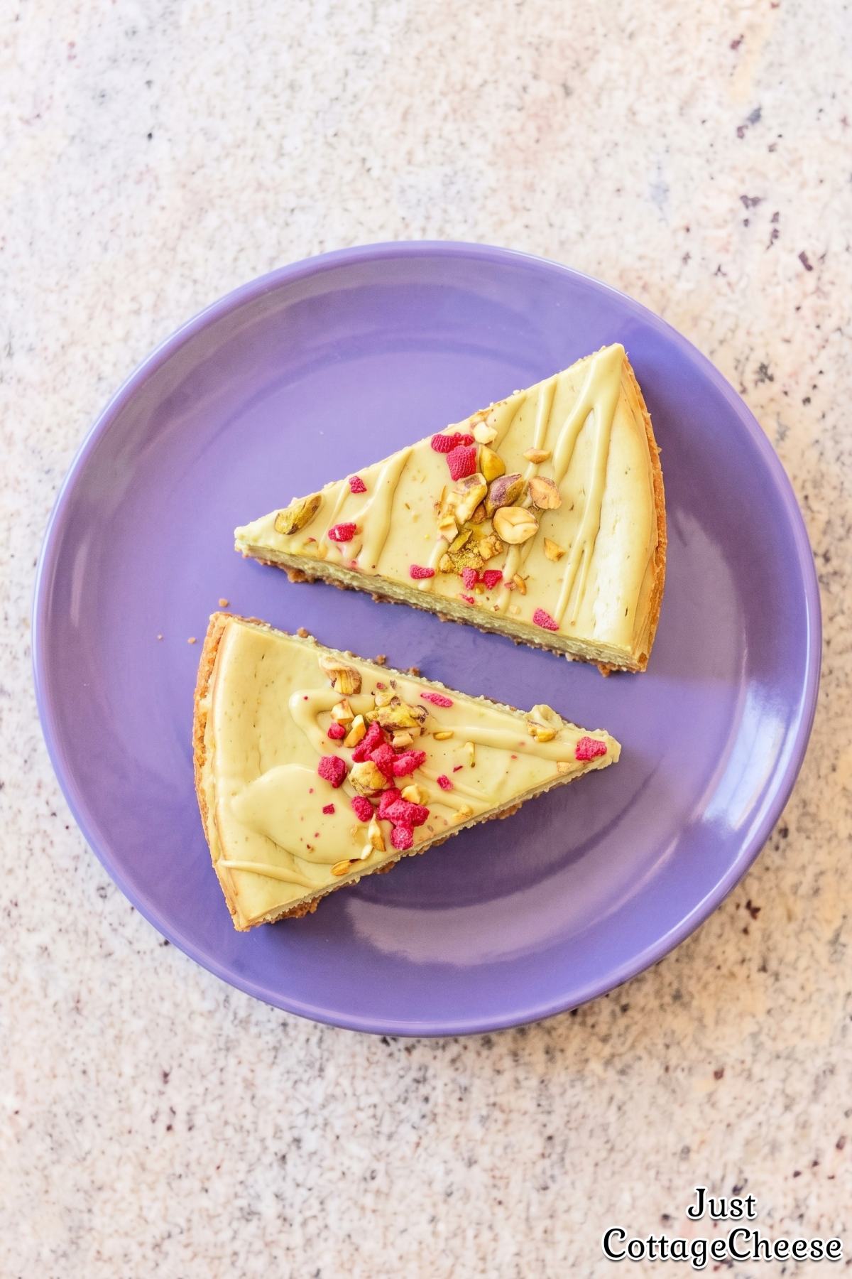 Pistachio protein cheesecake with crushed nuts