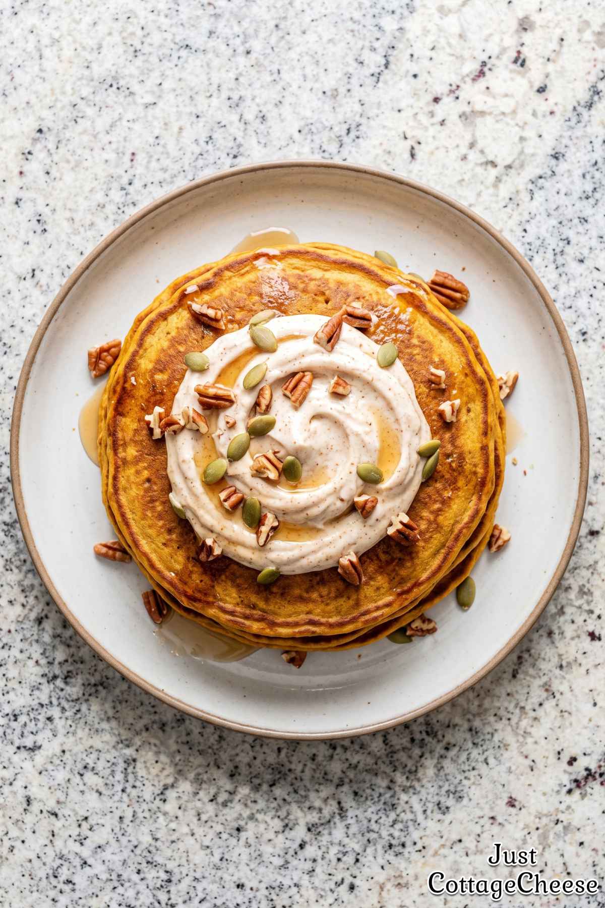 Stack of sweet cottage cheese protein pancakes.