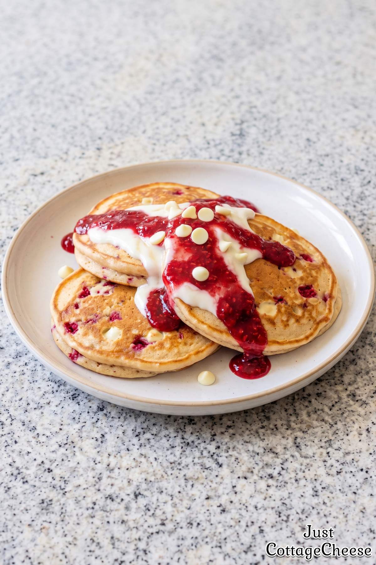 Stack of protein raspberry pancakes