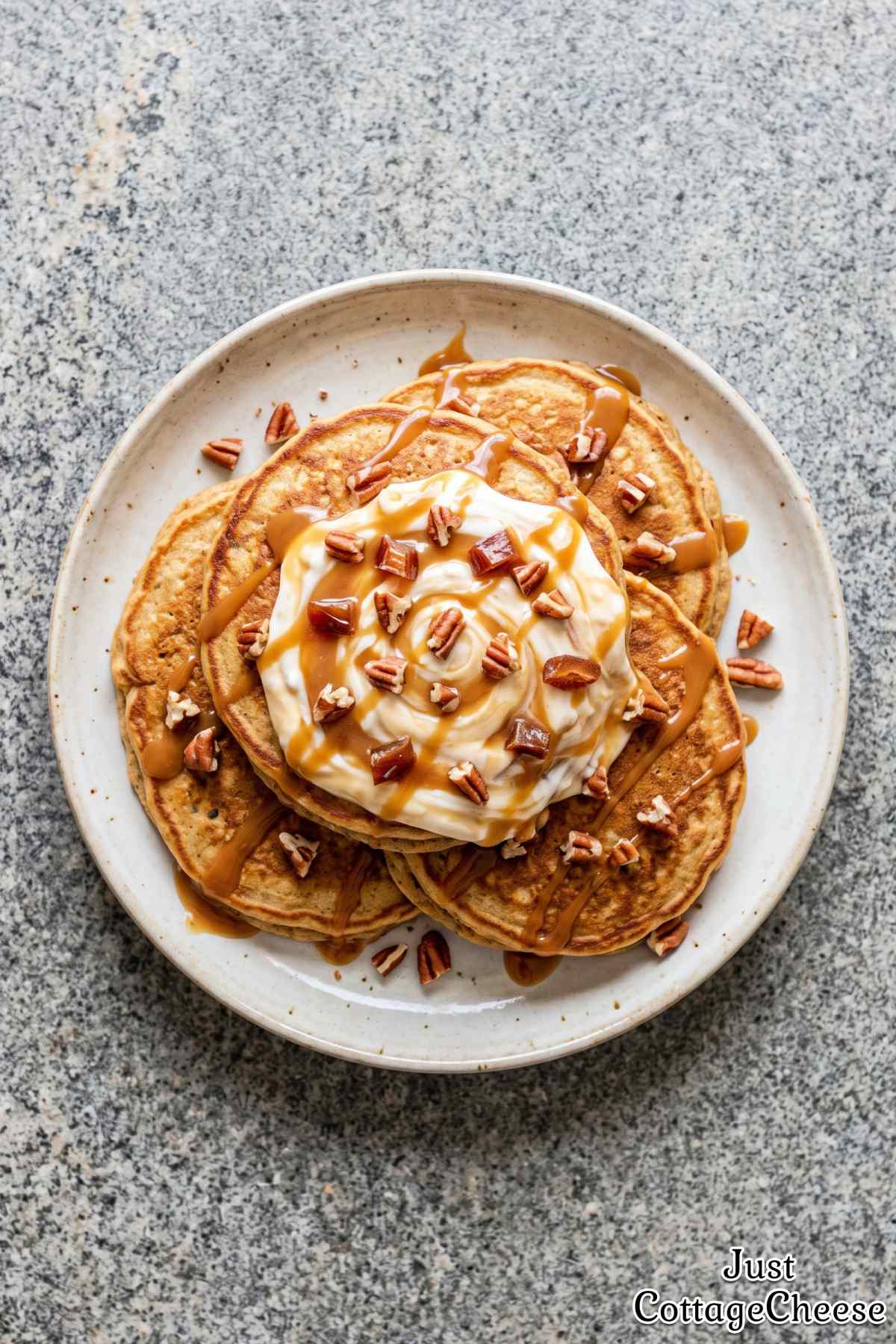 Sticky toffee protein pancakes with sweet sauce