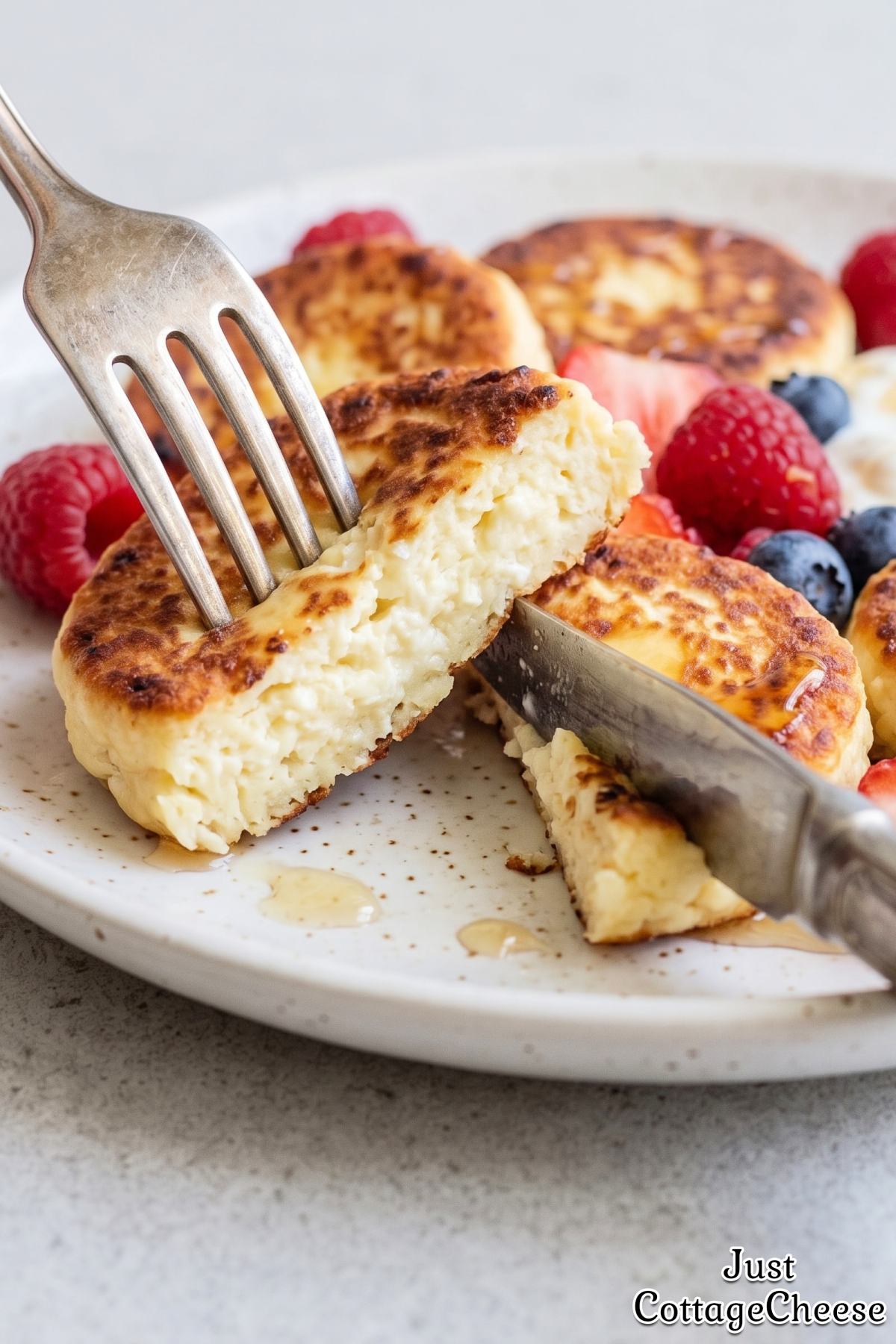 Healthy protein syrniki served with berries