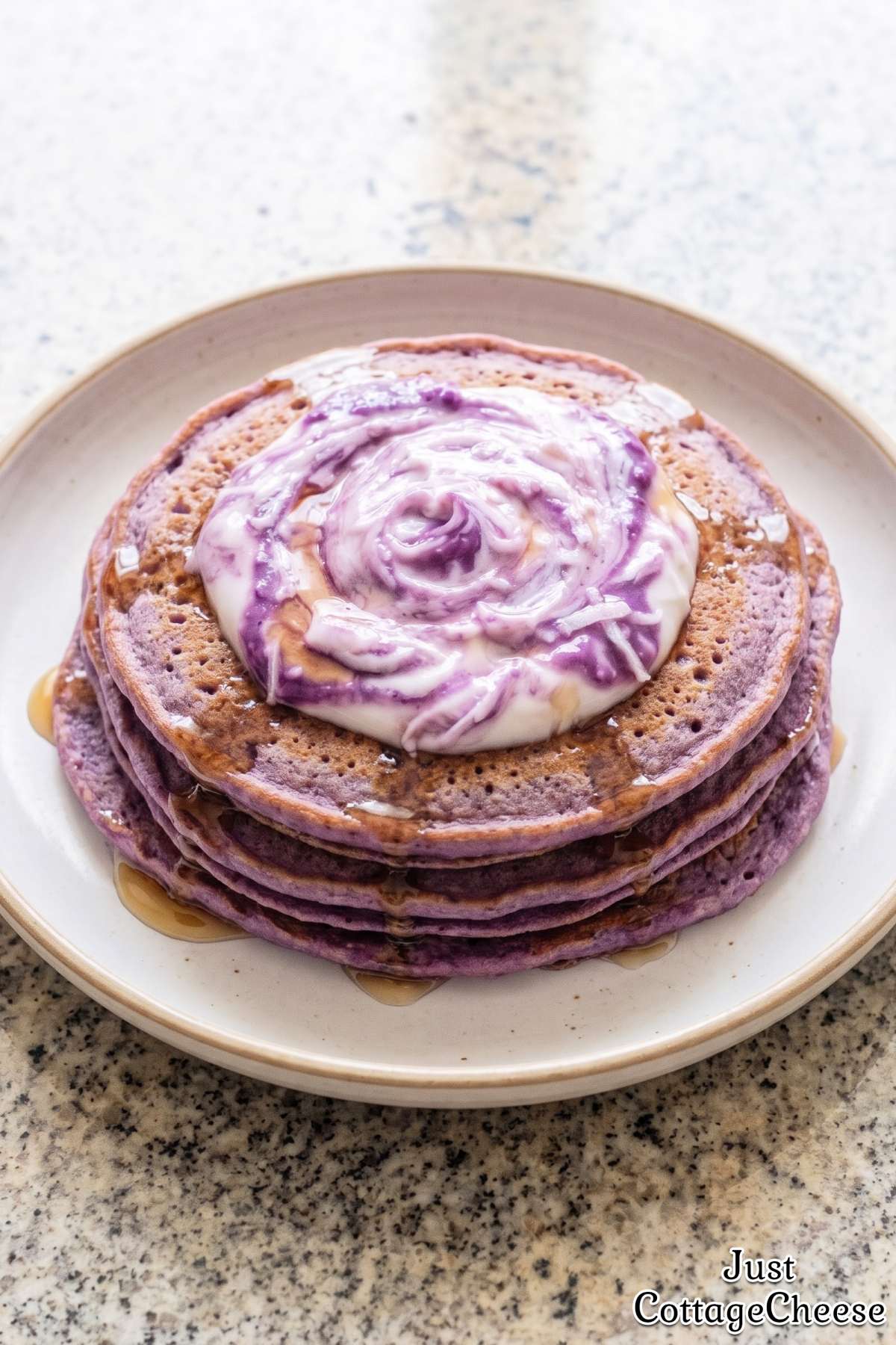 Fluffy purple ube coconut protein pancakes.
