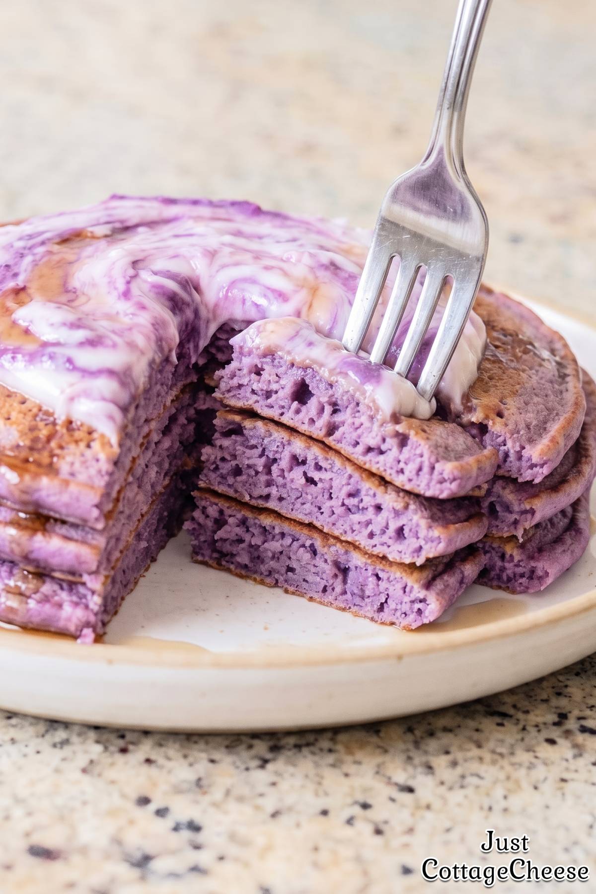 Creamy ube coconut high protein pancakes.