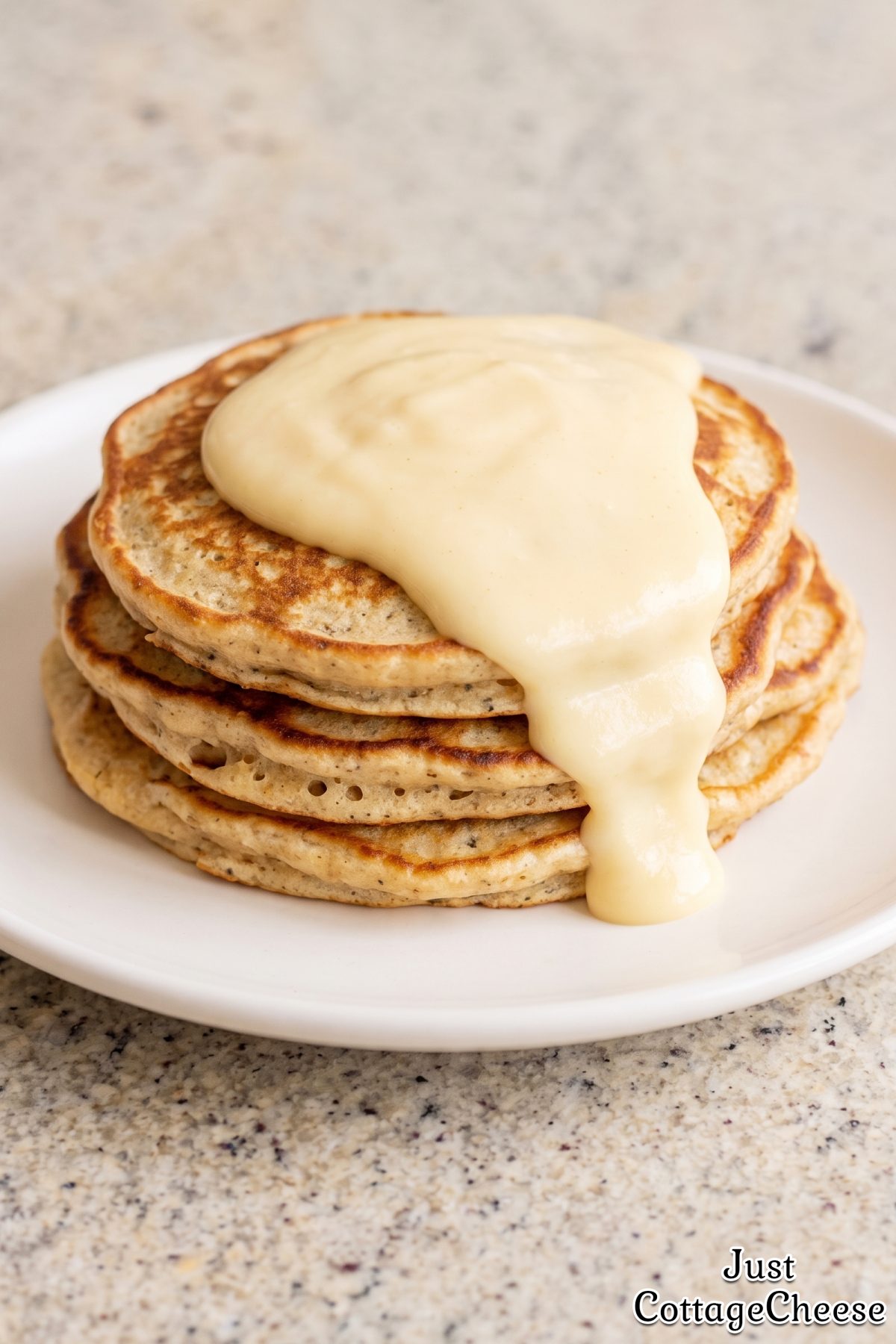 Golden vanilla protein pancakes stack